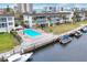 Community pool and boat slips with waterfront access at 4350 Chatham Dr # E106, Longboat Key, FL 34228