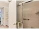 Bathroom with shower and built-in storage at 4350 Chatham Dr # E106, Longboat Key, FL 34228