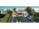 Beachfront community with parking and a building near the beach at 4350 Chatham Dr # E106, Longboat Key, FL 34228