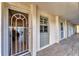 Condo hallway with tiled floors and access to unit at 4350 Chatham Dr # 106, Longboat Key, FL 34228