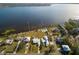 Aerial view of waterfront home with private pool and dock at 4511 7Th Street E Ct, Ellenton, FL 34222