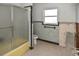 Bathroom with tiled walls and shower, under renovation at 4511 7Th Street E Ct, Ellenton, FL 34222