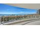 Stunning balcony view of the ocean and beach at 455 Longboat Club Rd # 305, Longboat Key, FL 34228