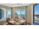 Glass dining table with ocean views from the condo at 455 Longboat Club Rd # 305, Longboat Key, FL 34228