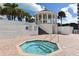 Octagonal hot tub with gazebo and stairs nearby at 455 Longboat Club Rd # 305, Longboat Key, FL 34228