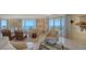 Relaxing living room with ocean views and comfortable seating at 455 Longboat Club Rd # 305, Longboat Key, FL 34228