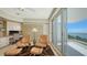 Home office with built-in wall unit and ocean view at 455 Longboat Club Rd # 305, Longboat Key, FL 34228