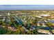 Aerial view of townhouses near a pond, showcasing a tranquil community setting at 4850 51St W St # 9106, Bradenton, FL 34210