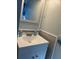 Updated bathroom with a vanity, mirror, and modern fixtures at 4915 Winged Foot Ave, Sarasota, FL 34234