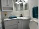 Clean bathroom with vanity, toilet and shower/tub combo at 4915 Winged Foot Ave, Sarasota, FL 34234