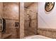 Spa-like bathroom with shower and built-in seating at 5250 Manorwood Dr # 4A, Sarasota, FL 34235