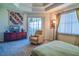 Main bedroom with access to balcony and ample closet space at 5250 Manorwood Dr # 4A, Sarasota, FL 34235