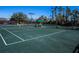 Well-maintained tennis courts with ample space for recreation at 5250 Manorwood Dr # 4A, Sarasota, FL 34235