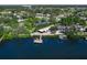 Waterfront home with private dock and pool, nestled in a quiet community at 5508 Dinah Ln, Sarasota, FL 34231