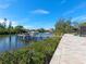 Private dock with boat lift and patio area at 5508 Dinah Ln, Sarasota, FL 34231