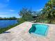 Enjoy this private pool with serene views of the canal at 5508 Dinah Ln, Sarasota, FL 34231