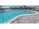 Large community pool with an zero entry, and plenty of seating surrounding the pool at 5527 Palmer Cir # 205, Bradenton, FL 34211