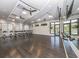 Light-filled yoga studio featuring wood floors, ballet barres, mirrors, and large windows with natural light at 5527 Palmer Cir # 205, Bradenton, FL 34211