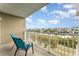 Balcony with waterfront view, comfortable seating, and an appealing blue sky at 559 Bahia Beach Blvd, Ruskin, FL 33570