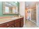 Bathroom featuring a granite countertop, wood vanity, and a separate shower at 559 Bahia Beach Blvd, Ruskin, FL 33570