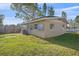 Exterior of the home with manicured lawn at 5713 Saint Louis Ave, Sarasota, FL 34233