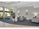 Inviting lobby area with comfortable seating, stylish decor, and abundant natural light at 5855 Midnight Pass Rd # 233, Sarasota, FL 34242