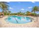 Relaxing community pool with ample seating at 5892 Semolino St, Nokomis, FL 34275