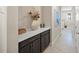 Laundry room with built-in cabinets and countertop at 5892 Semolino St, Nokomis, FL 34275