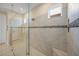 Large walk-in shower with glass enclosure and built-in seat at 5892 Semolino St, Nokomis, FL 34275