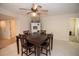 Dining room features a square table with four chairs and access to kitchen at 603 Saint Andrews Dr, Sarasota, FL 34243