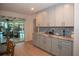 Kitchen with light gray cabinets and granite countertops at 603 Saint Andrews Dr, Sarasota, FL 34243