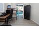 Home office with pool view and built-in desk at 603 Saint Andrews Dr, Sarasota, FL 34243