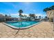 Community pool with patio and palm trees at 6091 Coral Way, Bradenton, FL 34207