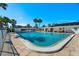 Community swimming pool with surrounding patio at 6091 Coral Way, Bradenton, FL 34207