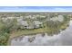 Aerial view of condo building near water at 6334 Grand Oak Cir # 201, Bradenton, FL 34203