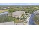 Aerial view of condo building and parking at 6334 Grand Oak Cir # 201, Bradenton, FL 34203