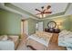 Comfortable bedroom with ceiling fan and large closet at 6334 Grand Oak Cir # 201, Bradenton, FL 34203