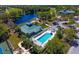 Community pool and clubhouse aerial view at 6334 Grand Oak Cir # 201, Bradenton, FL 34203