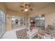 Bright screened-in porch with access to kitchen and living room at 6334 Grand Oak Cir # 201, Bradenton, FL 34203