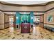 Welcoming community entrance with a stylish reception desk at 6814 Willowshire Way, Bradenton, FL 34212