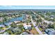 Aerial view showcasing home's location in a residential neighborhood at 6851 Country Lakes Cir, Sarasota, FL 34243