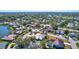 Aerial view showcasing home's location in a residential neighborhood at 6851 Country Lakes Cir, Sarasota, FL 34243