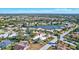 Aerial view showcasing home's location in a residential neighborhood at 6851 Country Lakes Cir, Sarasota, FL 34243