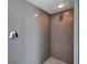 Clean and modern shower with gray tile walls at 6851 Country Lakes Cir, Sarasota, FL 34243