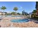 Hot tub and lounge chairs near the pool at 6868 Wild Lake Ter, Bradenton, FL 34212