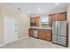 Kitchen features stainless steel appliances and wood cabinets at 6868 Wild Lake Ter, Bradenton, FL 34212