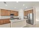 Modern kitchen with stainless steel appliances and granite countertops at 6868 Wild Lake Ter, Bradenton, FL 34212