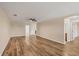 Spacious living room with ceiling fan and wood floors at 6868 Wild Lake Ter, Bradenton, FL 34212