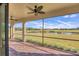 Screened porch overlooking a pond and golf course at 6868 Wild Lake Ter, Bradenton, FL 34212