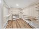 Large walk-in closet with ample shelving and hanging space at 6868 Wild Lake Ter, Bradenton, FL 34212